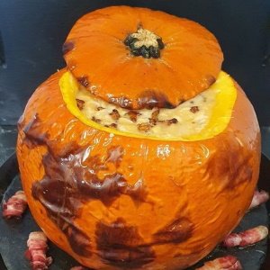 Pumpkin soup cooked in a pumpkin